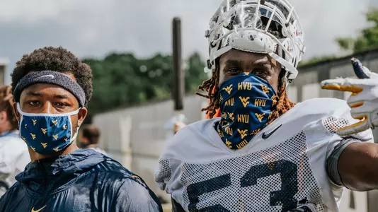 Players wearing masks - Football