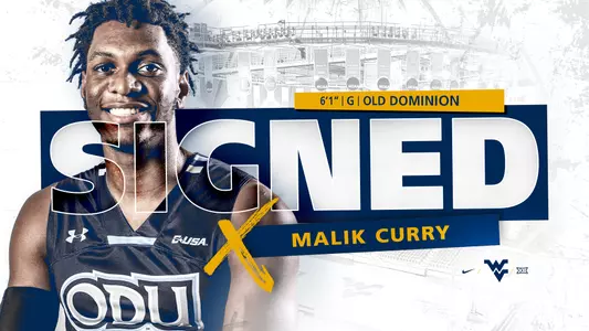 Malik Curry Signing