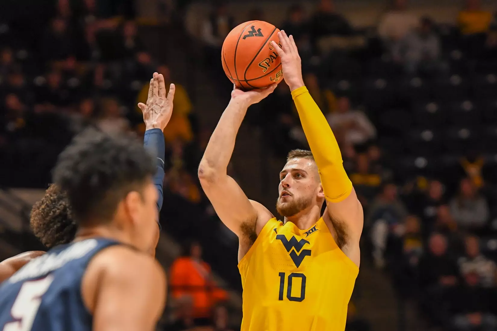 Erik Stevenson shoots a three.