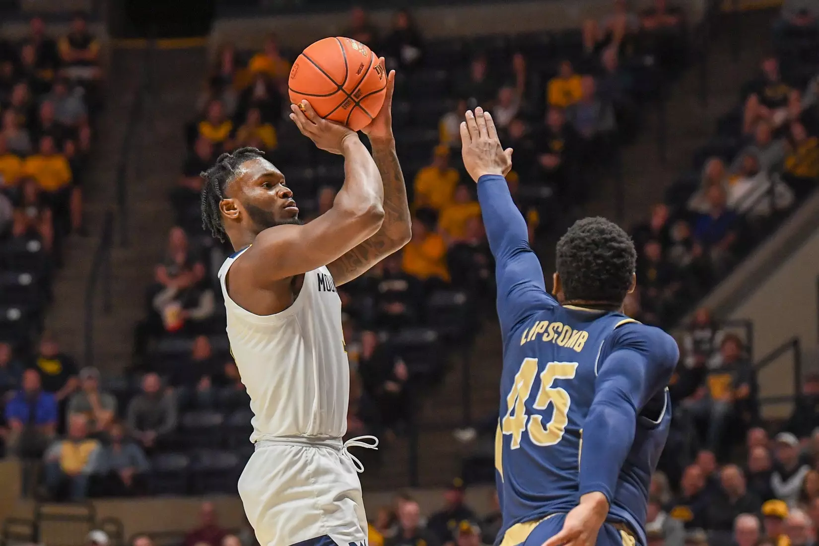Joe Toussaint shoots for two.
