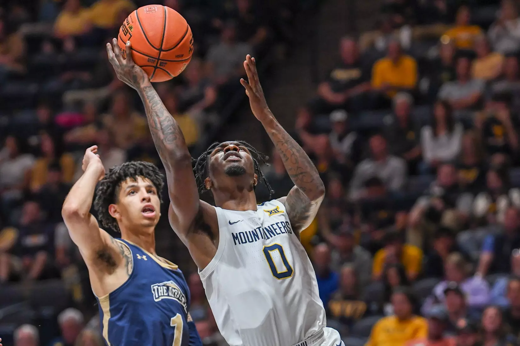 Kedrian Johnson on the layup.