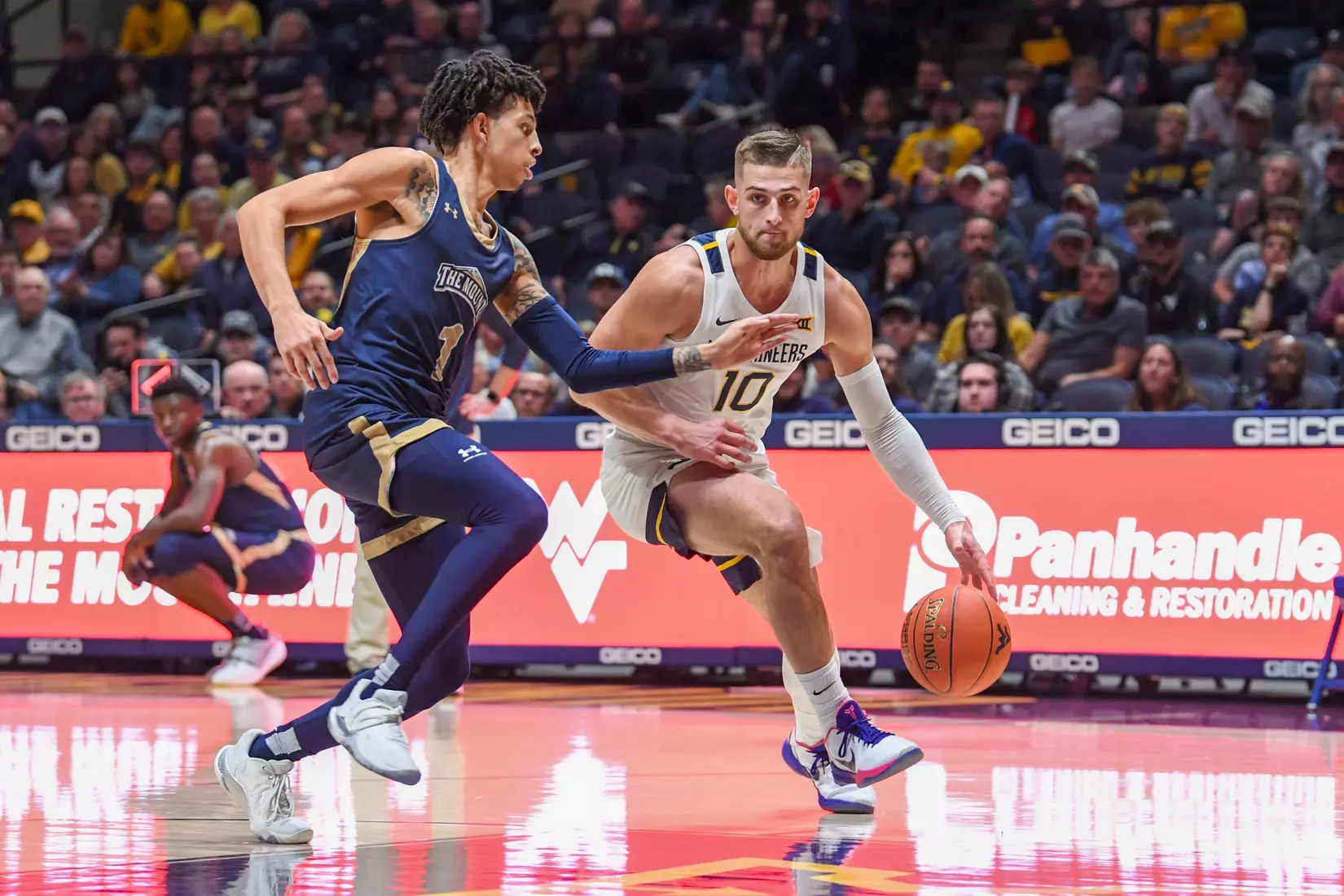 Erik Stevenson drives to the basket.