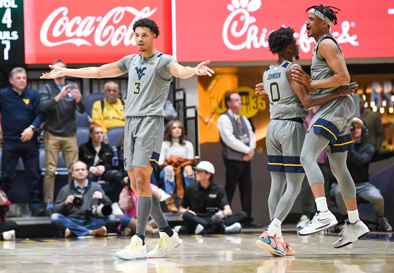 Tre Mitchell works the student section.