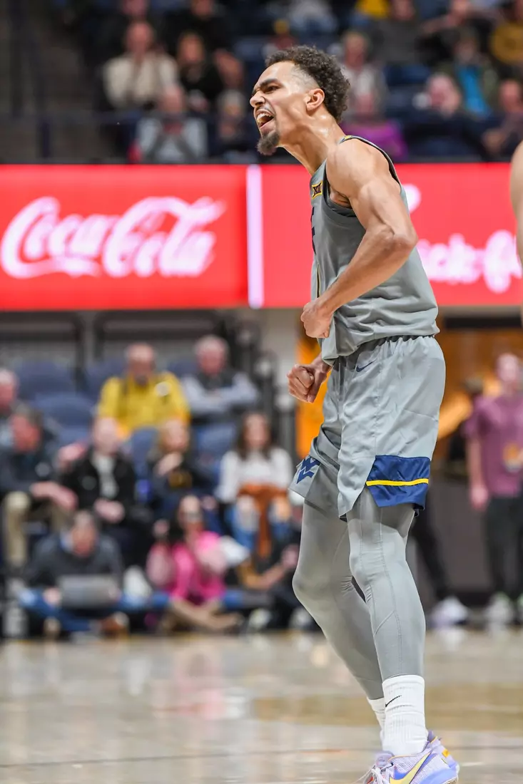 Emmitt Matthews Jr. celebrates a three.