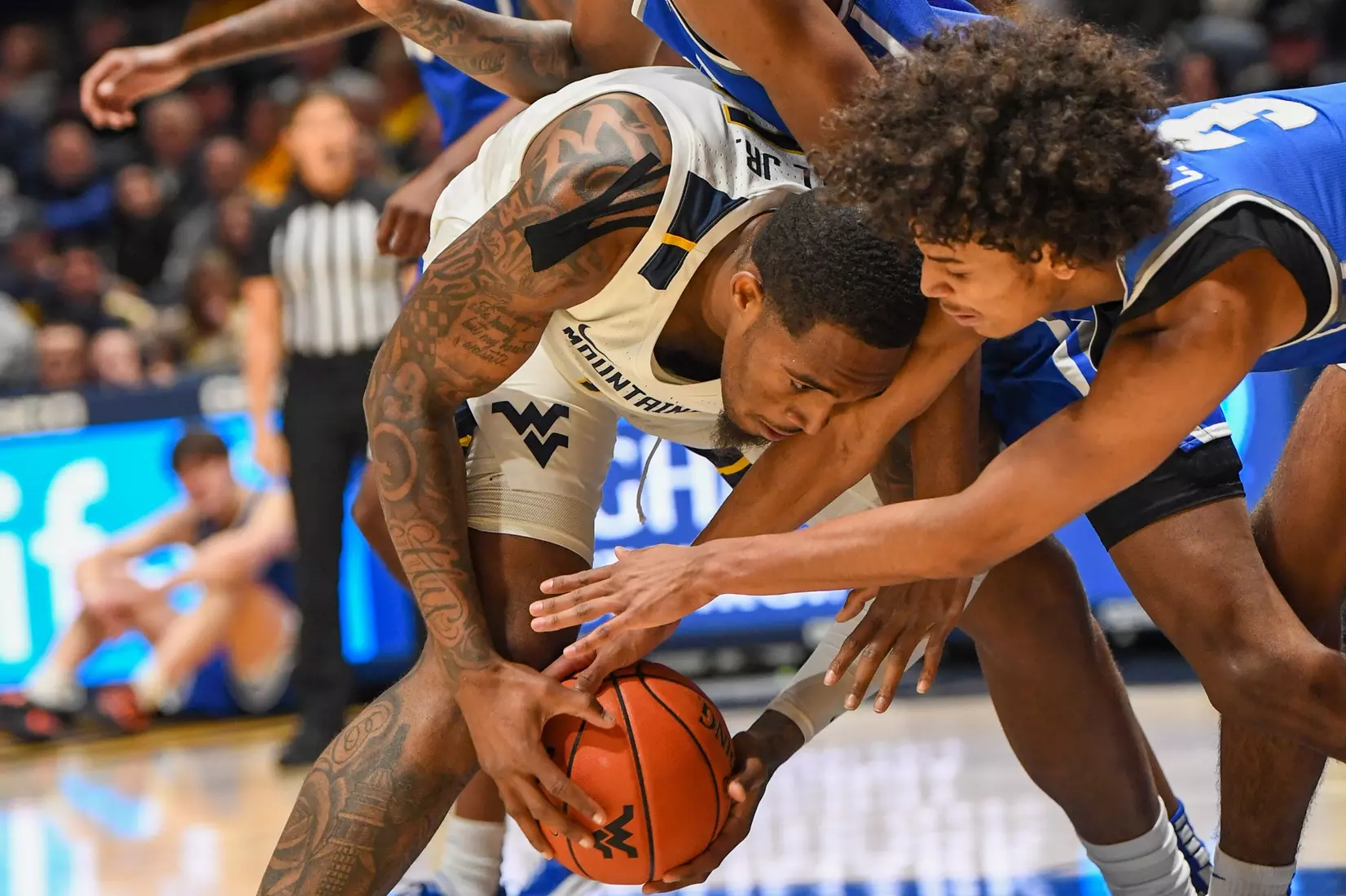 Jimmy Bell Jr. fights for a loose ball.