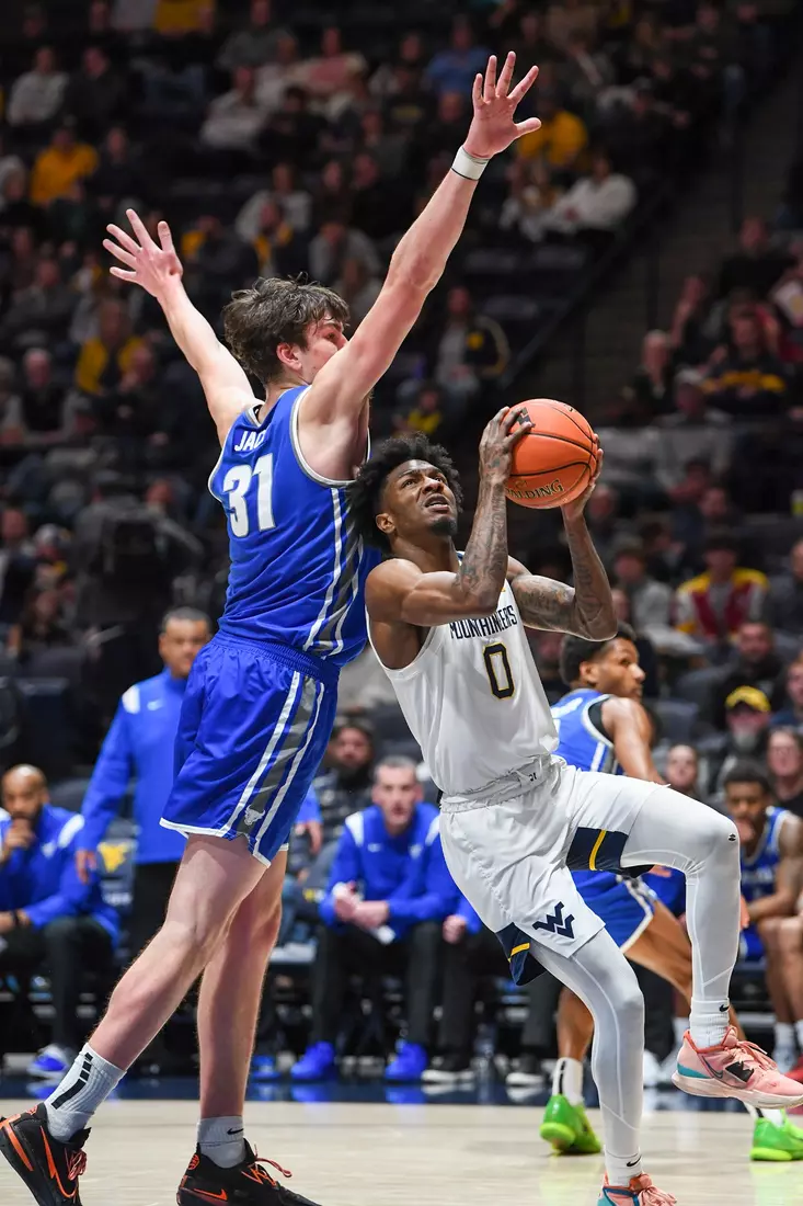 Kedrian Johnson on the layup.