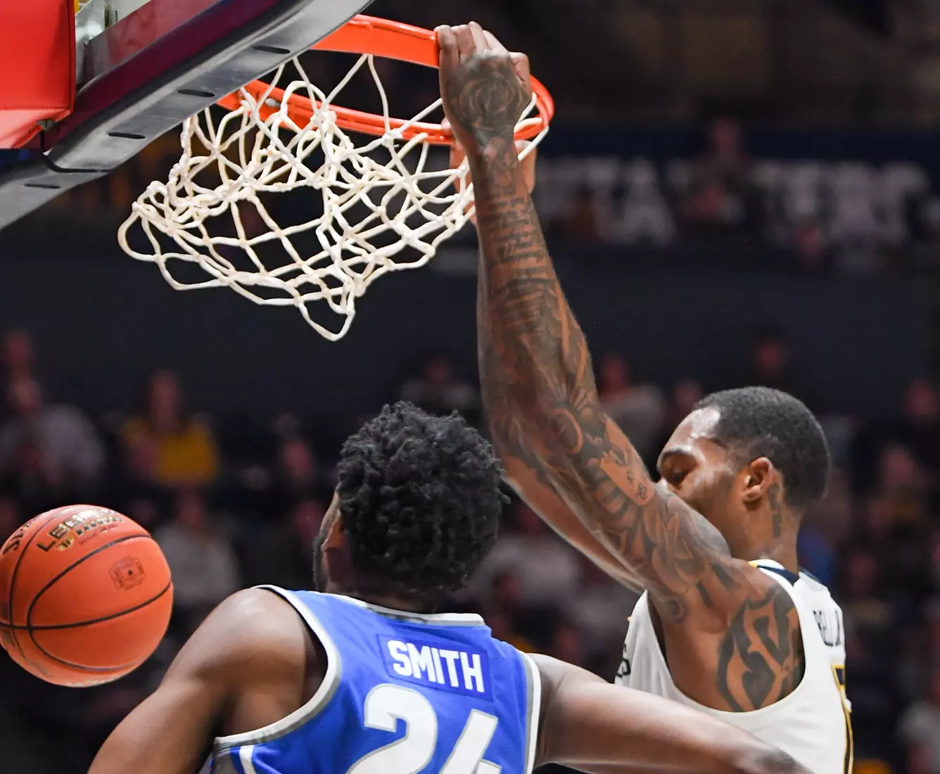 Jimmy Bell Jr. slams the basket.