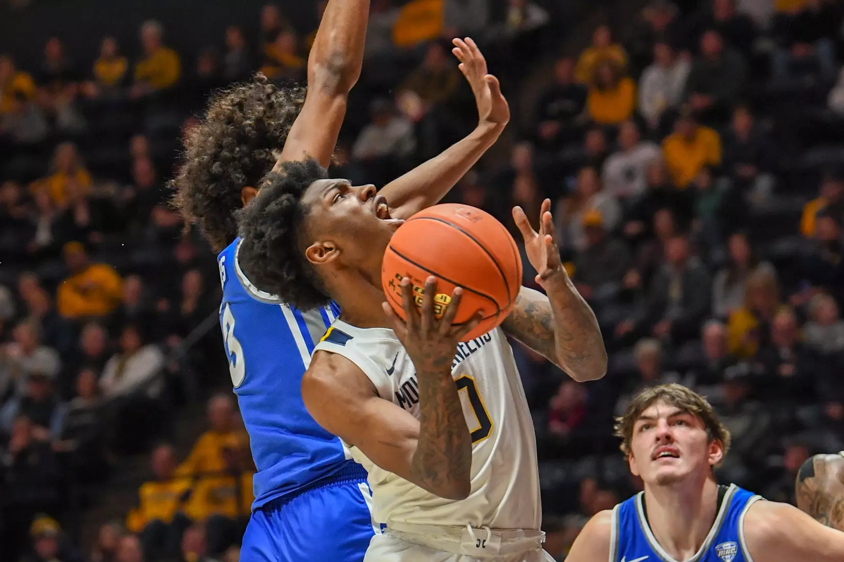 Kedrian Johnson scores.