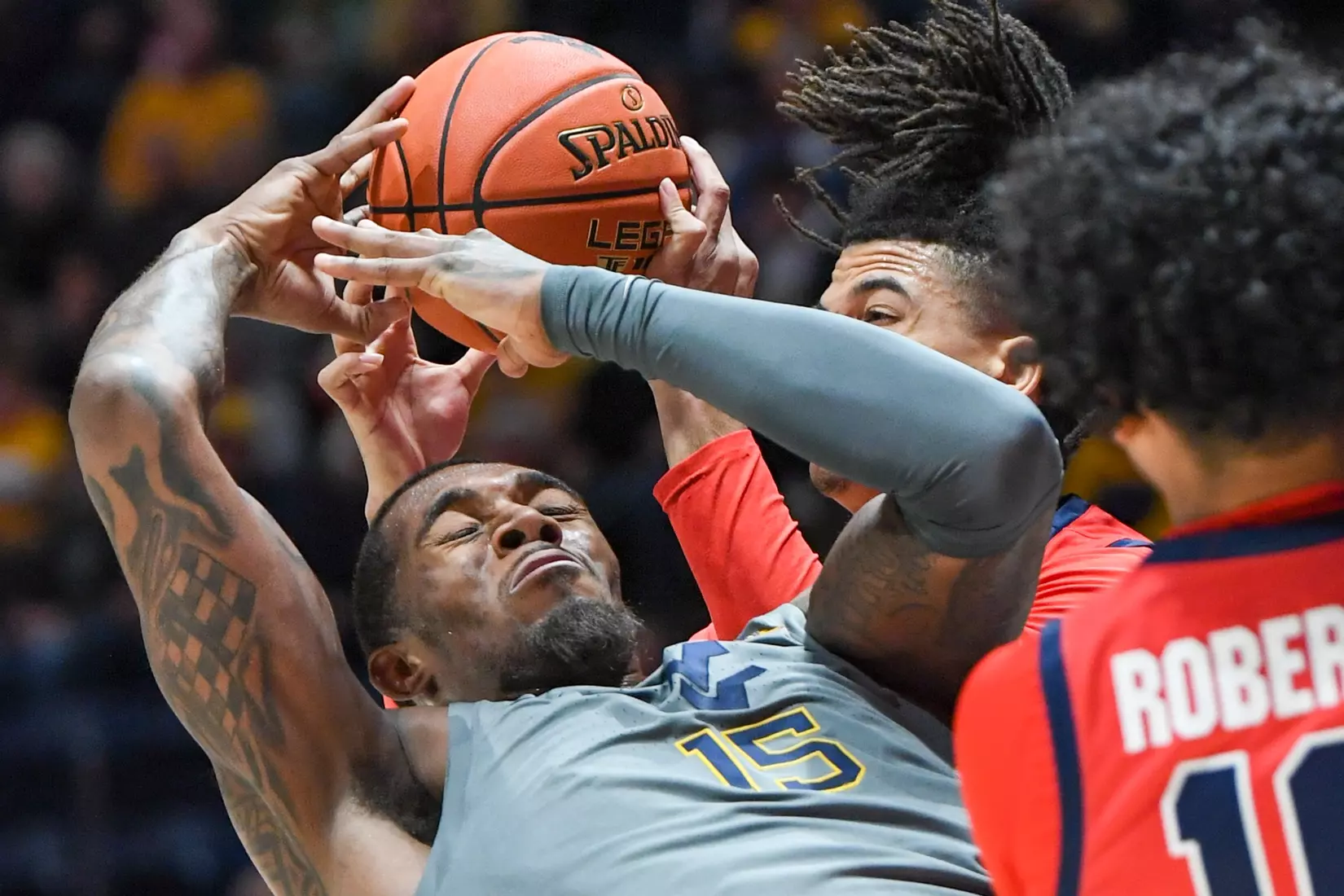 Jimmy Bell Jr. grabs an offensive rebound.