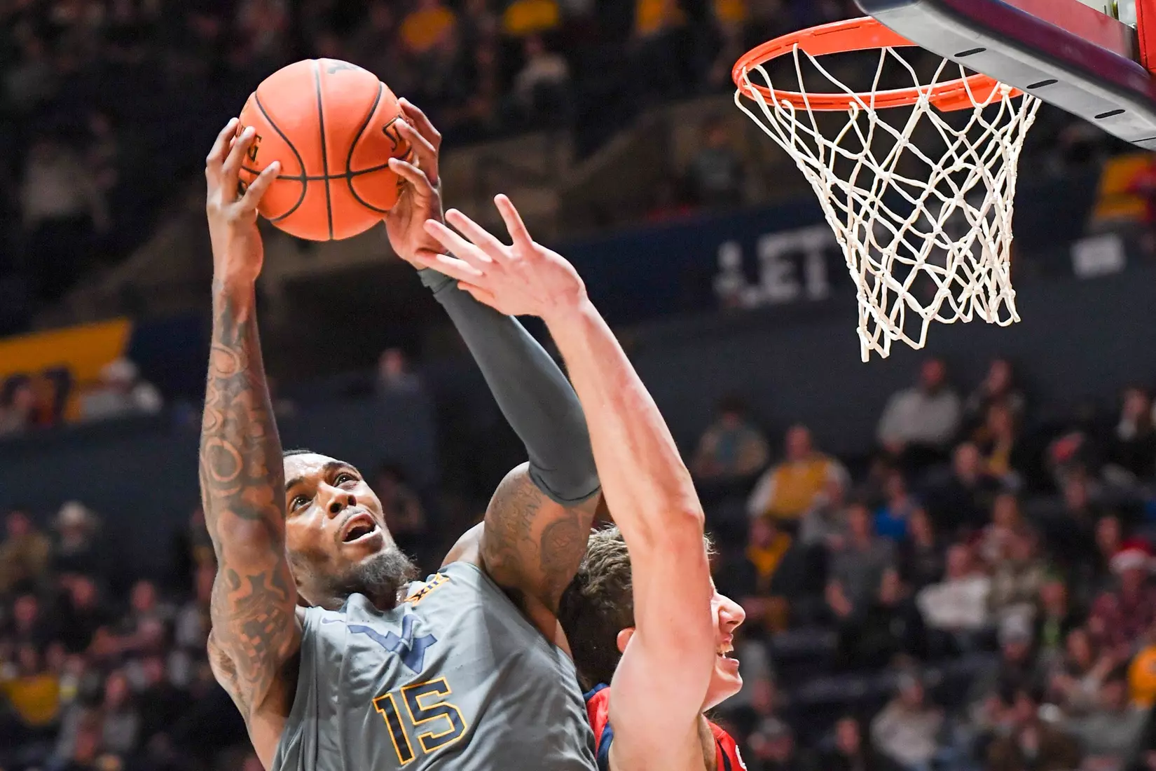 Jimmy Bell Jr. grabs an offensive rebound.