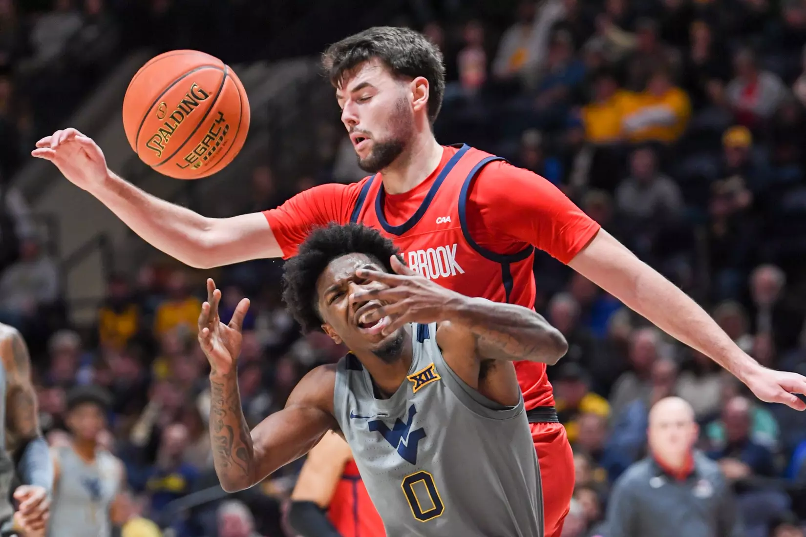 Kedrian Johnson is fouled in the paint.