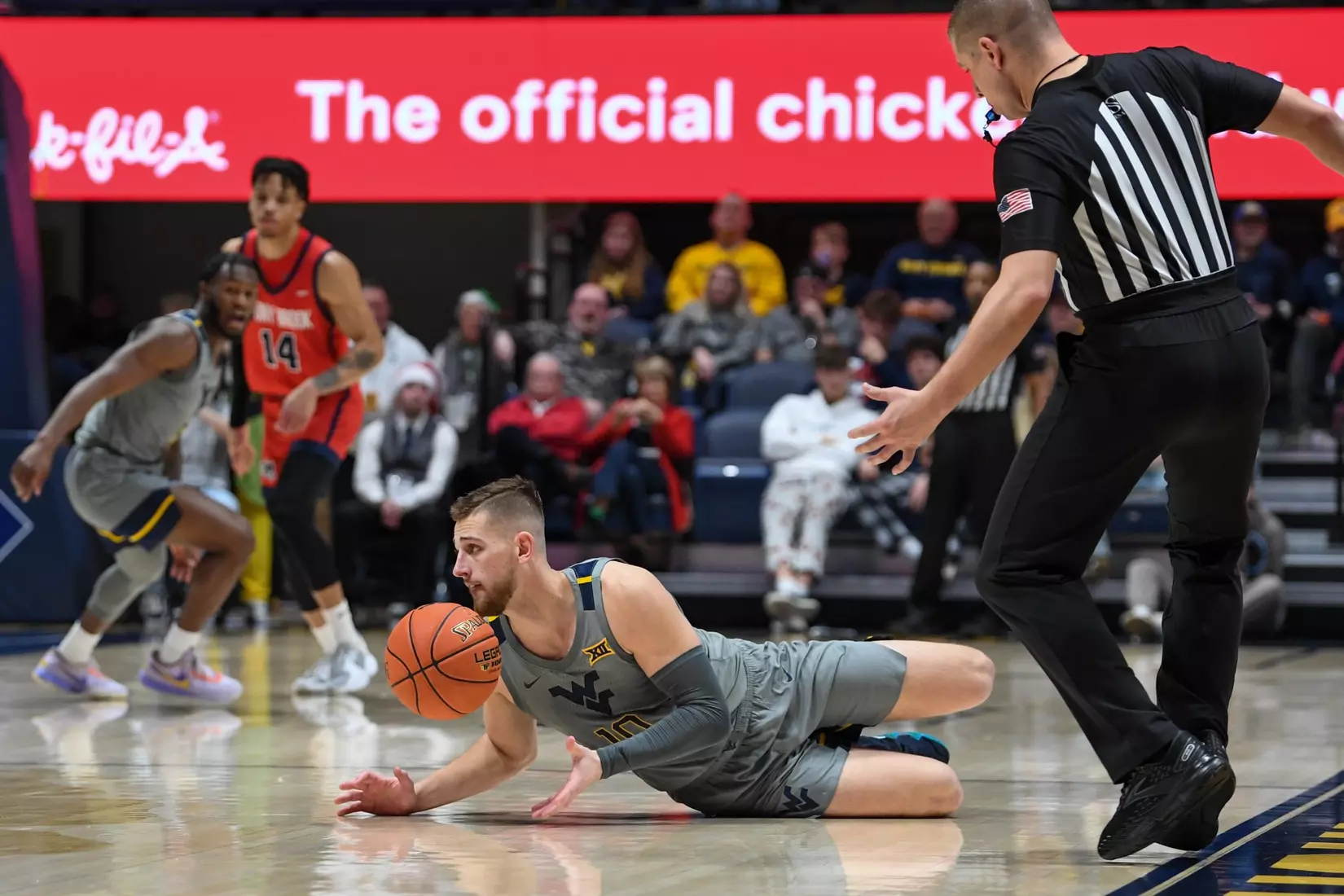 Erik Stevenson dives for the loose ball.