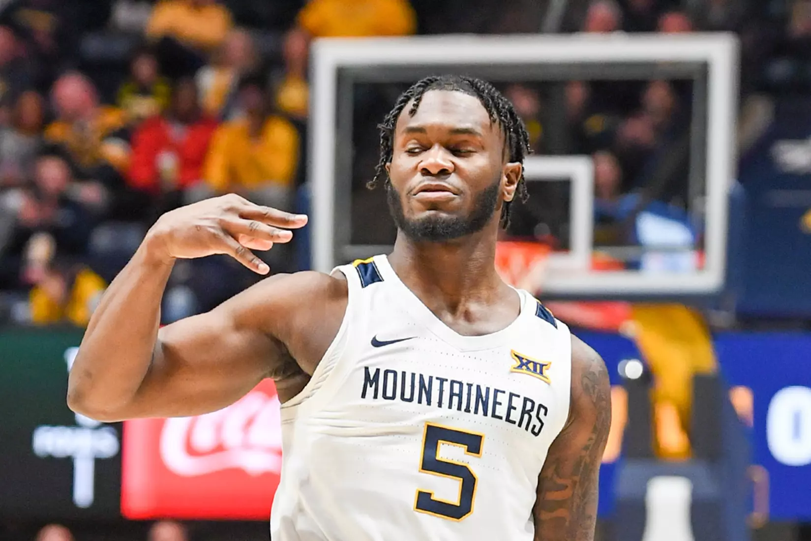 Joe Toussaint enjoys a three-pointer.