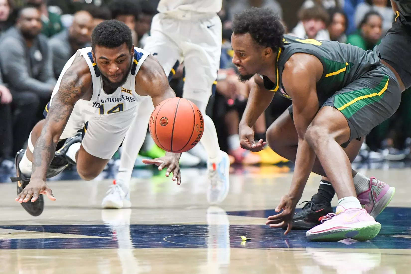Seth Wilson dives for a loose ball.