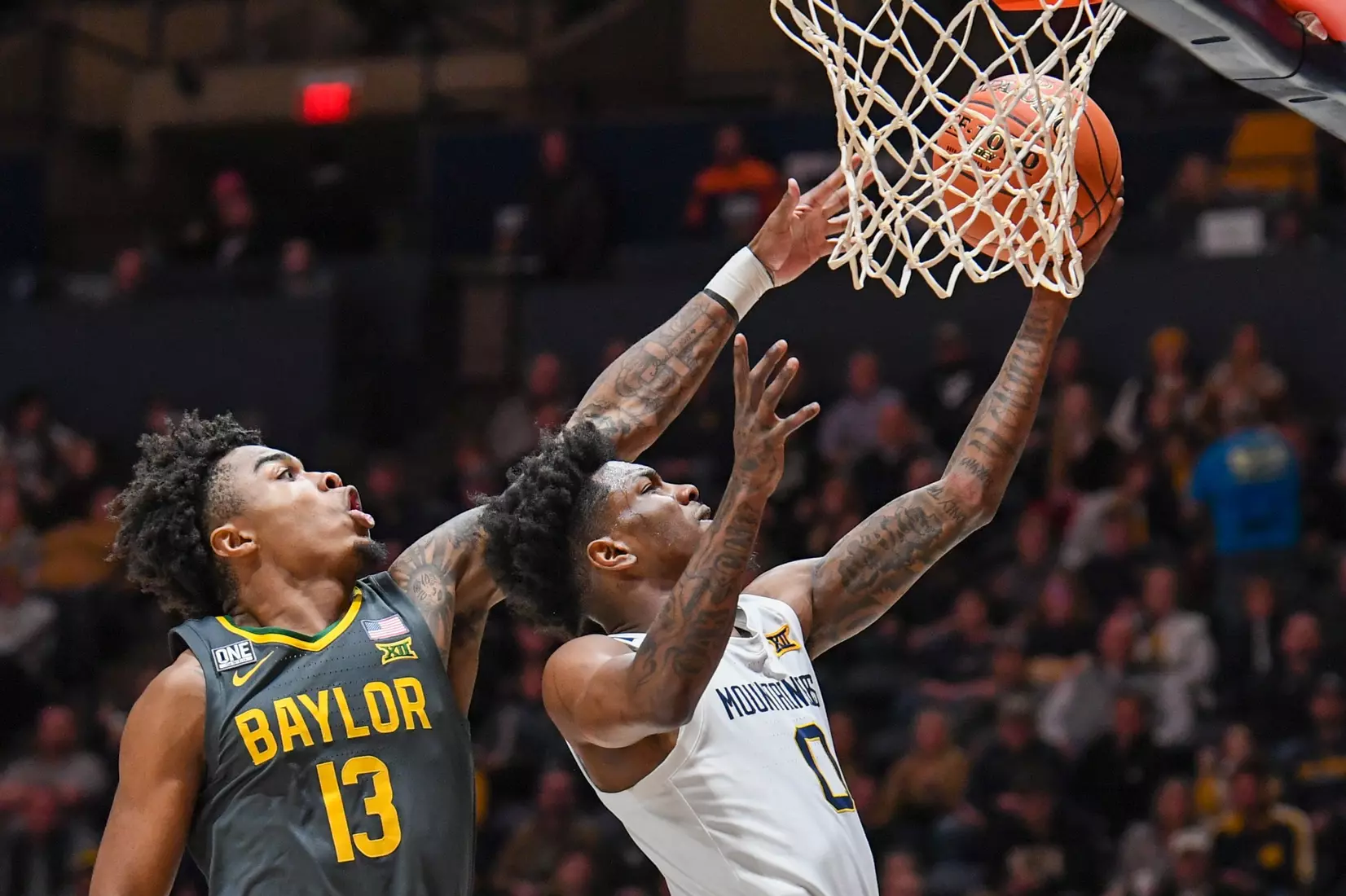 Kedrian Johnson scores on a layup.