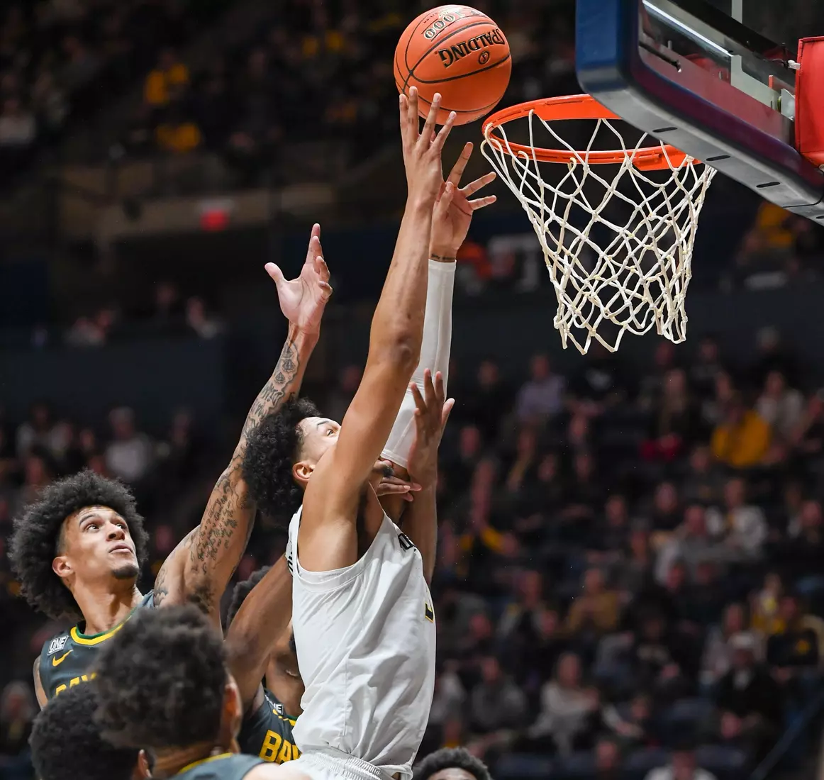 Tre Mitchell on the put-back.