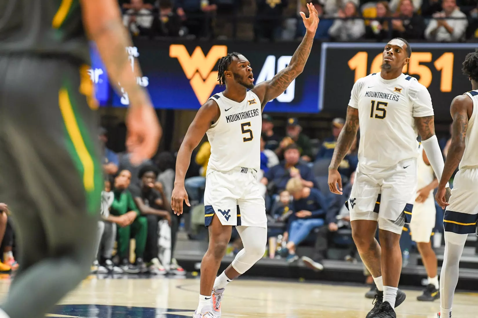 Joe Toussaint tries to work the crowd.