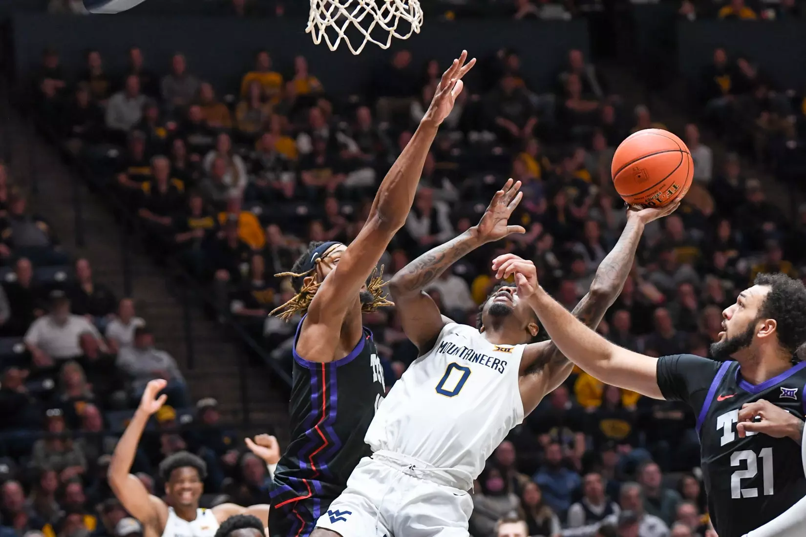 Kedrian Johnson in the paint.,