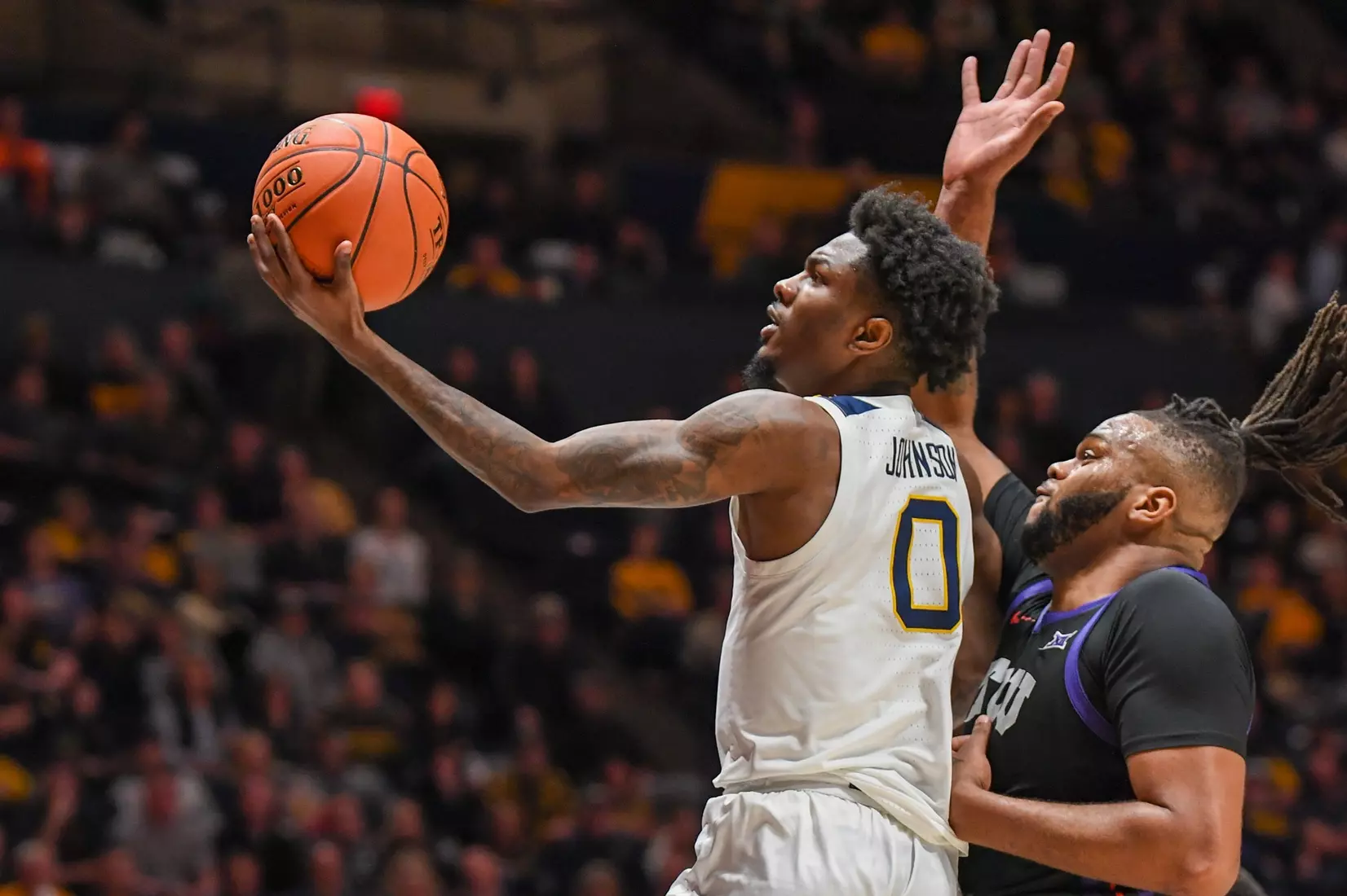 Kedrian Johnson scoops and scores.