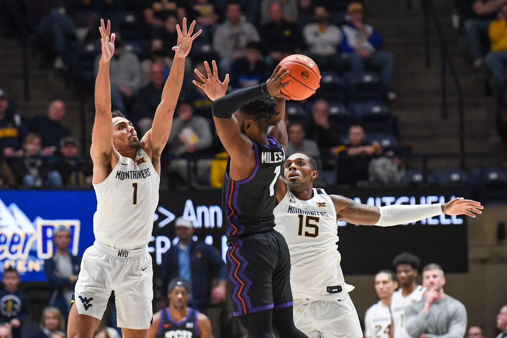 Emmitt Mattthews Jr. and Jimmy Bell Jr. play defense.