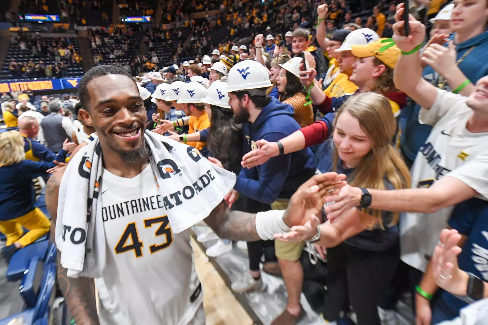 Jimmy Bell Jr. celebrates the win with the student section.