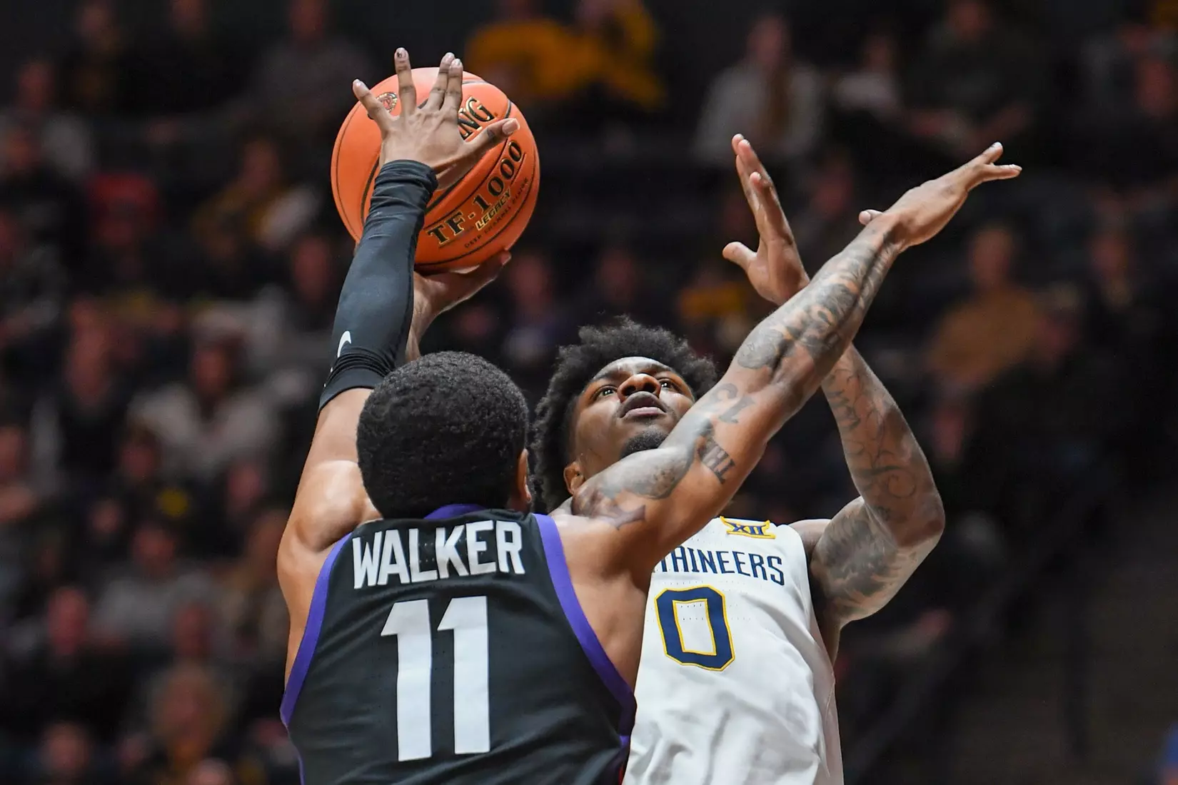 Kedrian Johnson shoots in the paint.