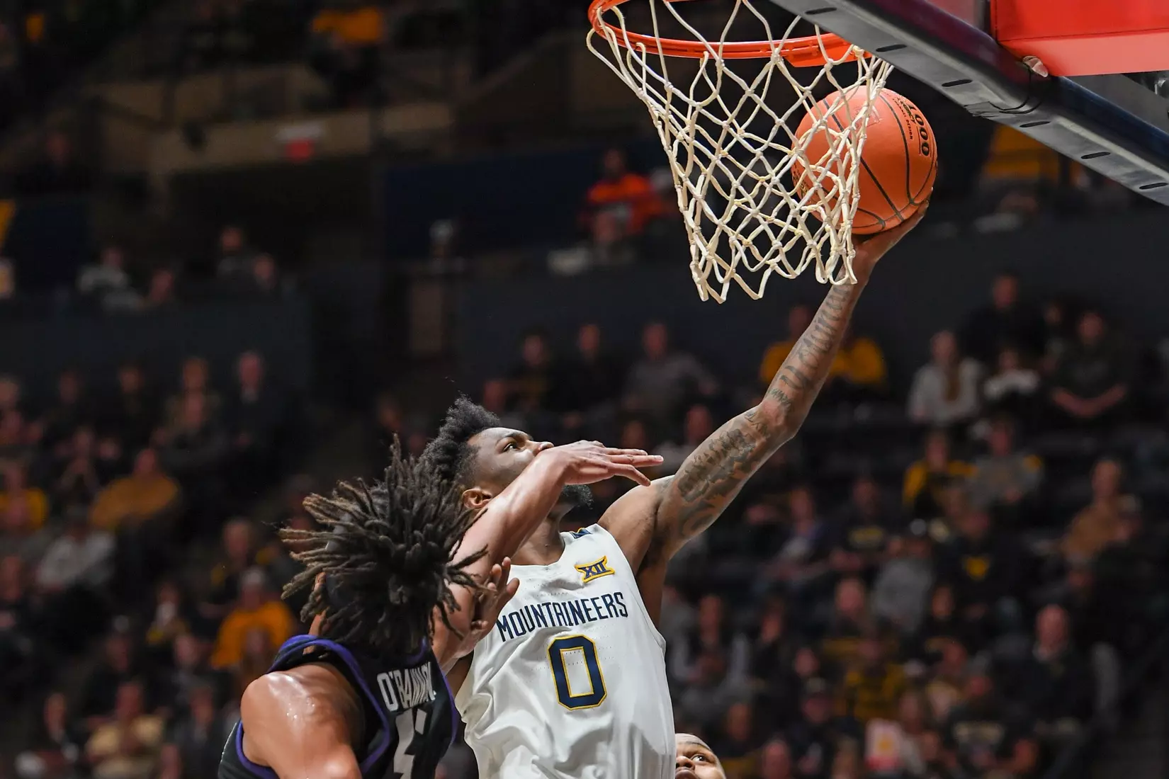 Kedrian Johnson scores.