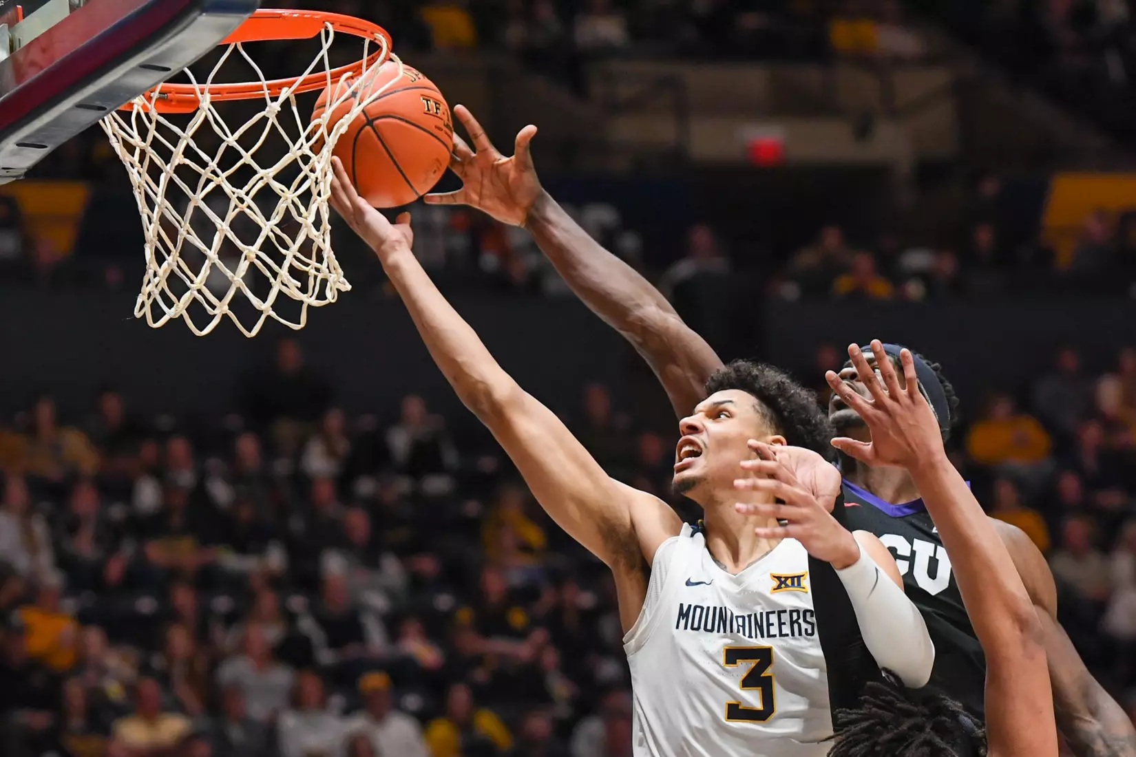 Tre Mitchell scores on the scoop.