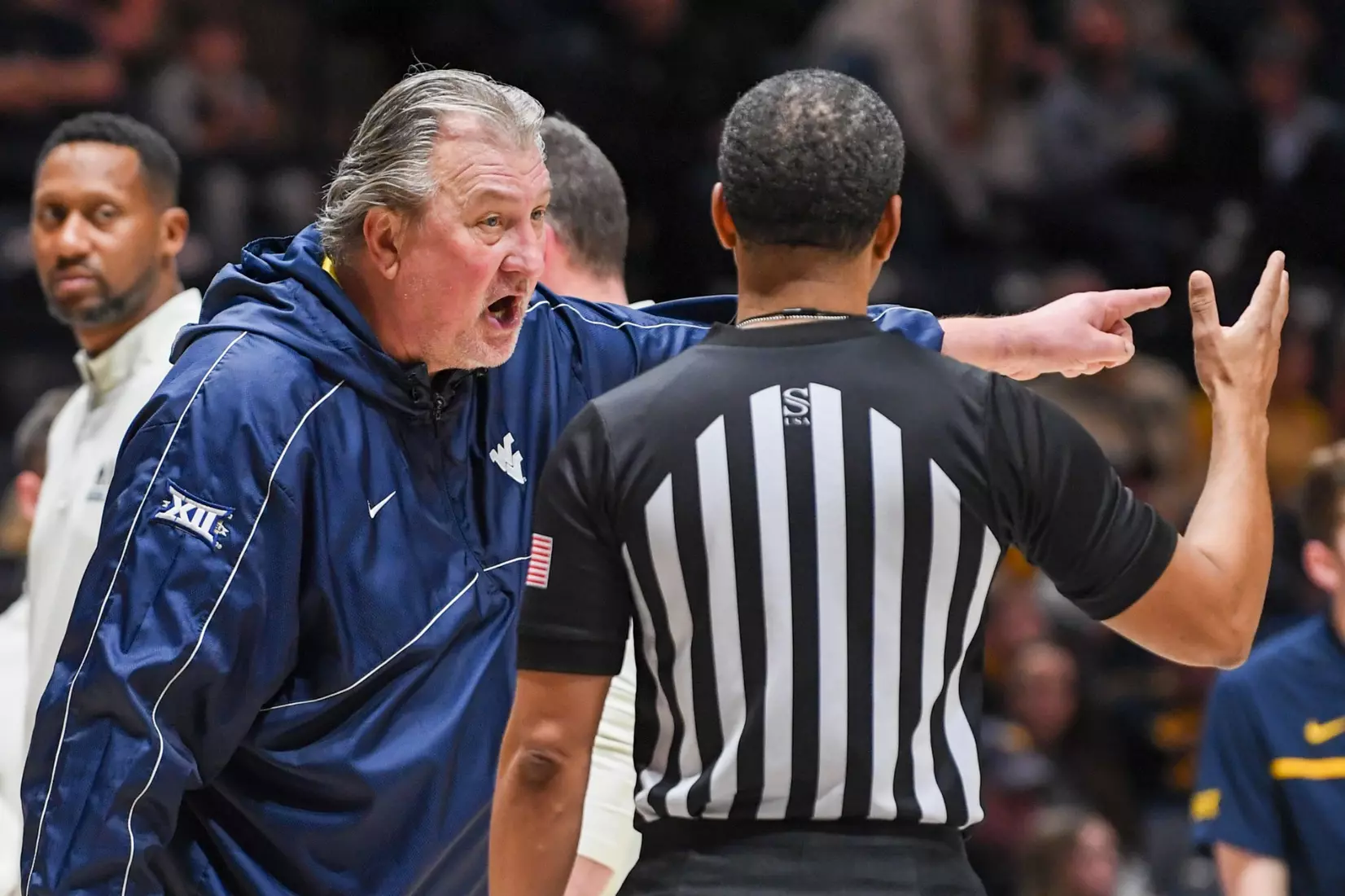 Bob Huggins points out a difference of opinion.