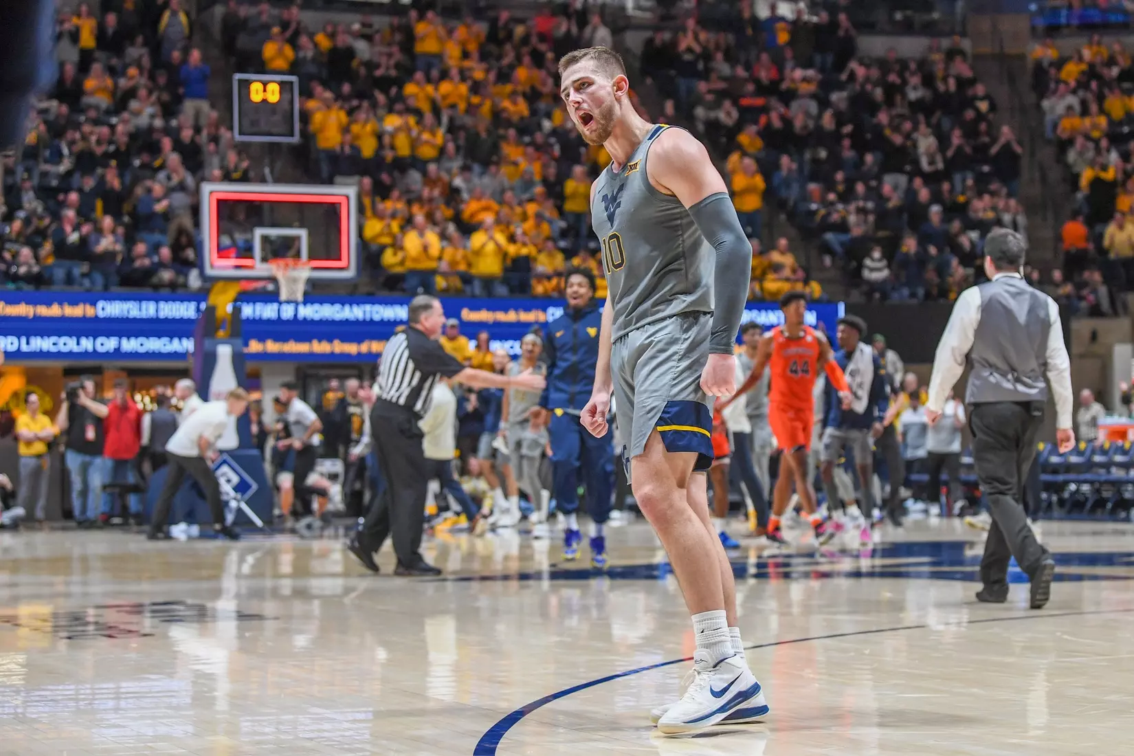 Erik Stevenson celebrates the three.