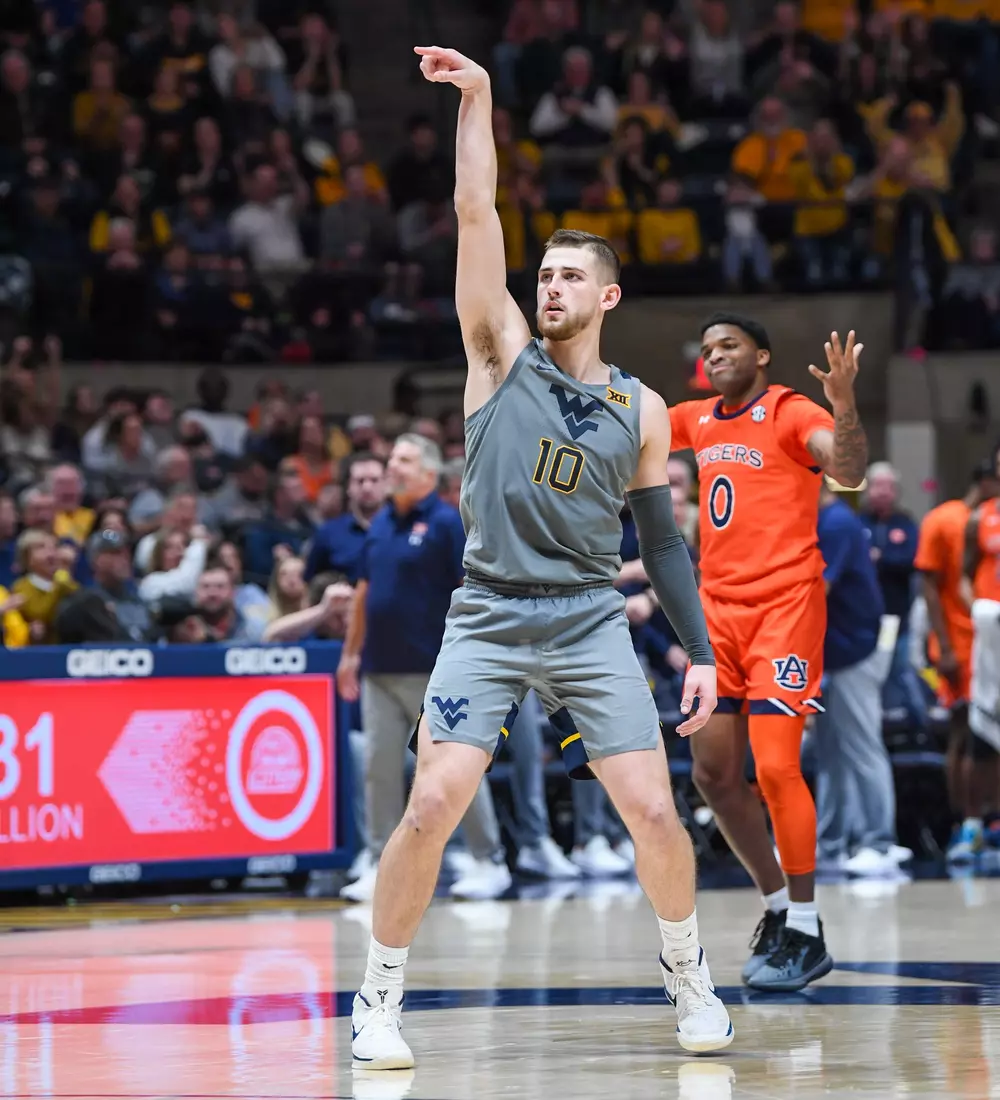 Erik Stevenson celebrates the three.