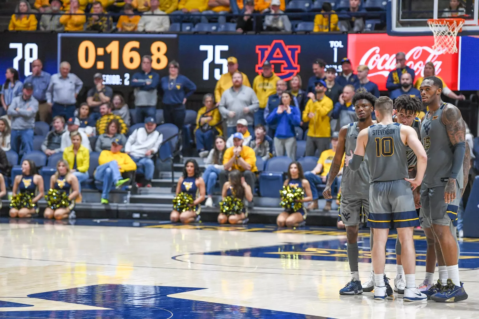 The Mountaineers huddle with just under 17 seconds remaining against Auburn.