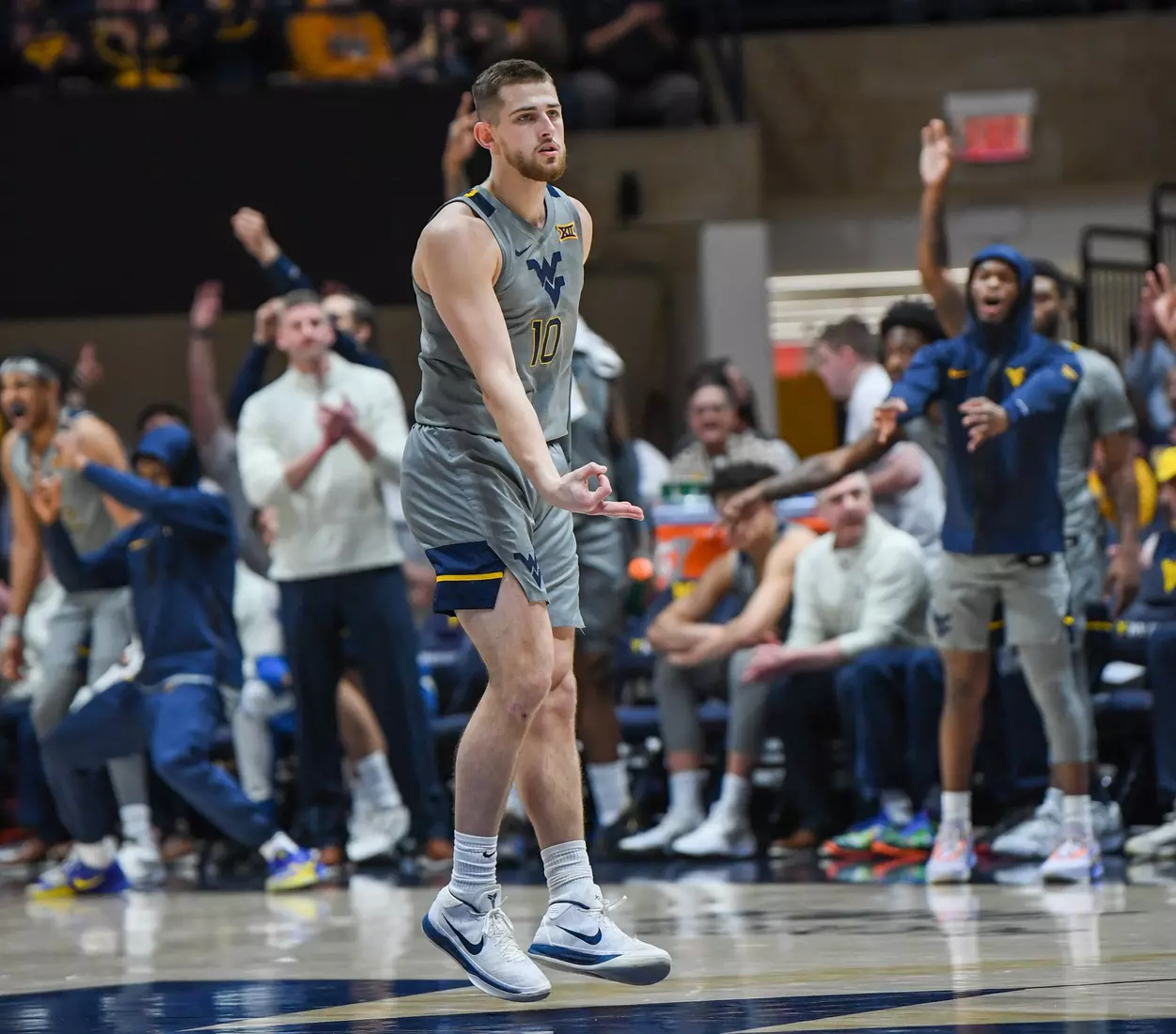 Erik Stevenson celebrates the three.