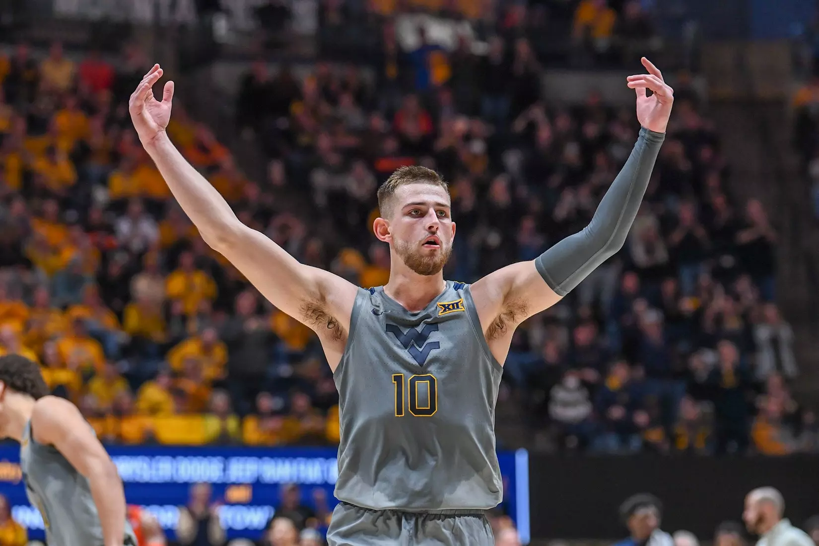 Erik Stevenson celebrates a three-pointer.