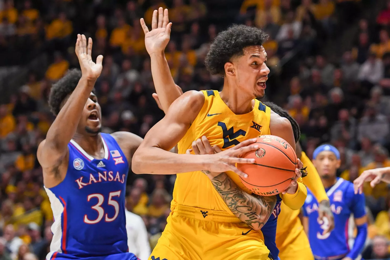 Tre Mitchell drives to the hoop.