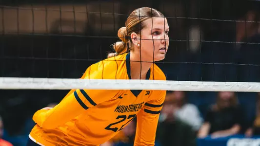 Maddy McGath at the net