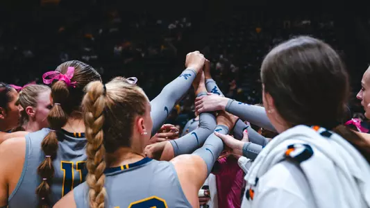 Volleyball team huddle
