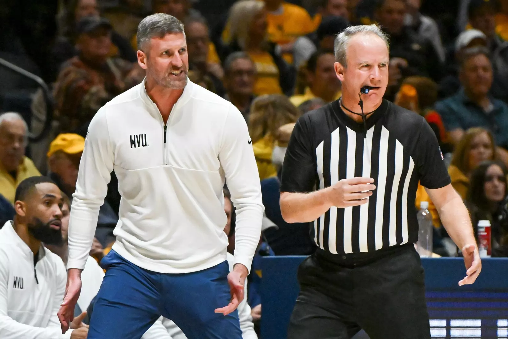 Head coach Josh Eilert argues a call with the official.