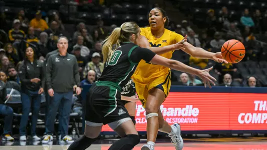 Tirzah Moore passes in the paint.