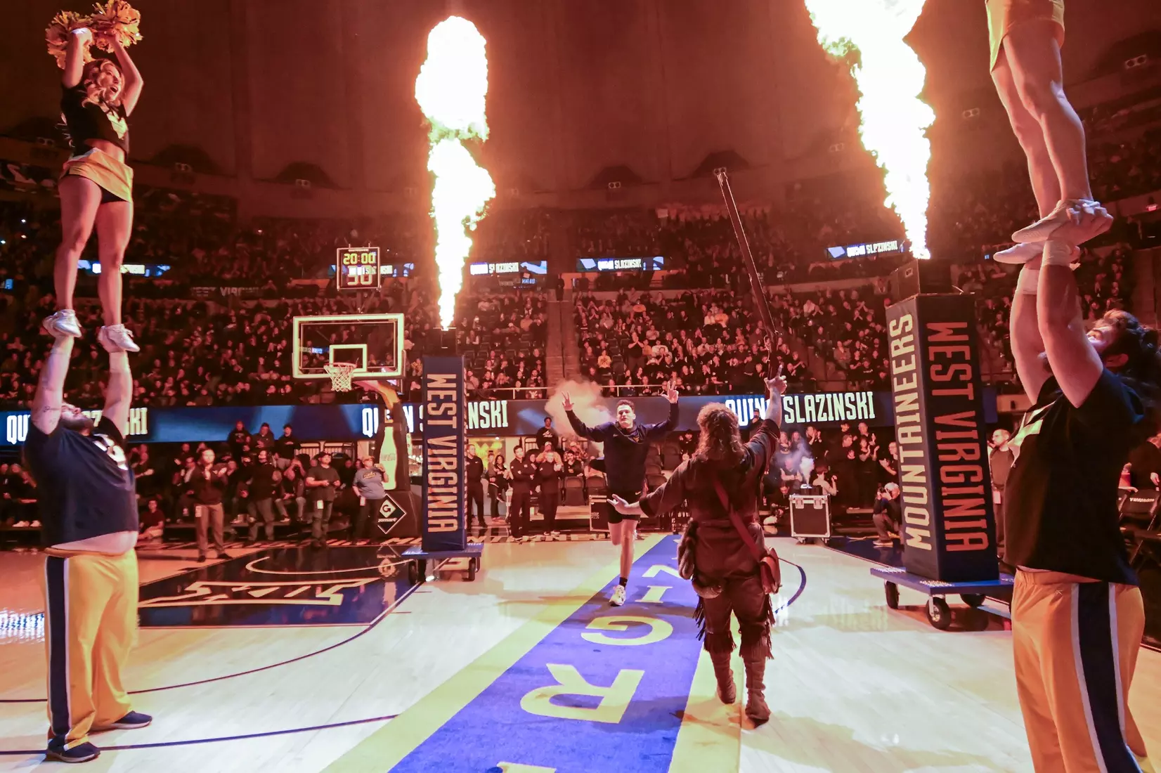 Quinn Slazinski runs the carpet.