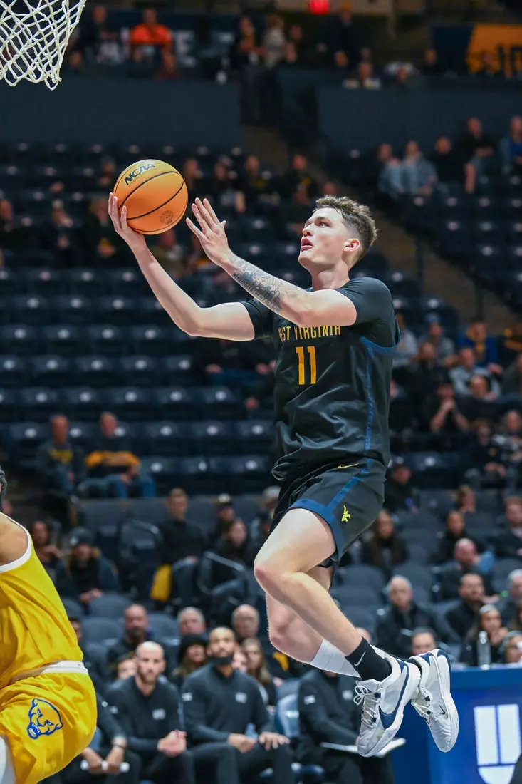 Quinn Slazinski glides to the basket.