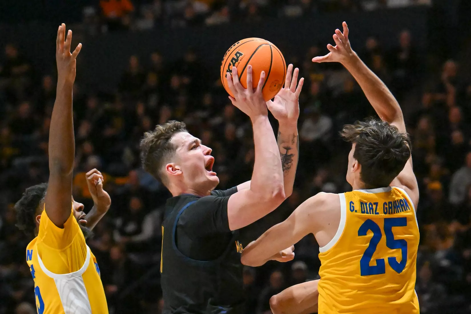 Quinn Slazinski shoots for two.