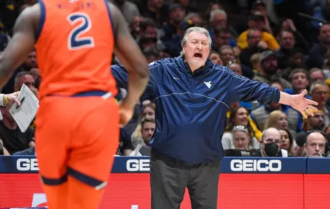 Bob Huggins screams for a call.