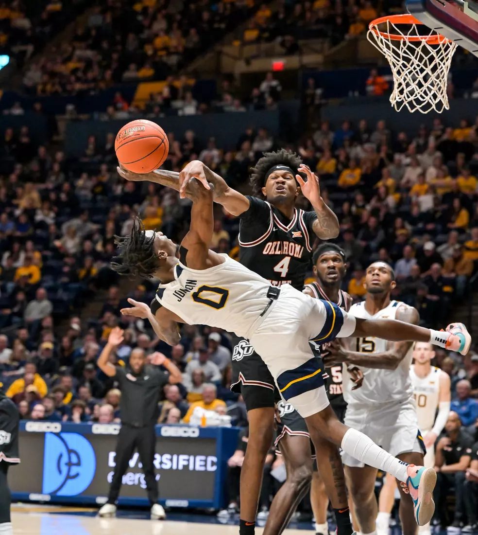 Kedrian Johnson goes airborne for a shot.