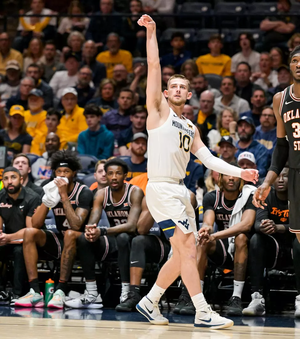 Erik Stevenson holds the three-pose.