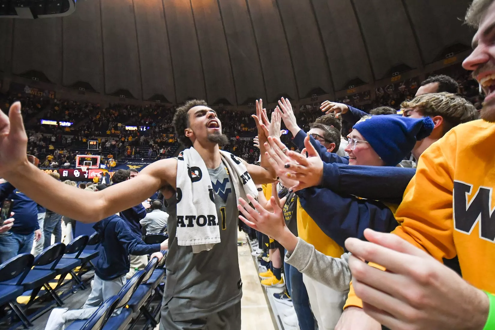 Emmitt Matthews Jr. celebrates with the student section.