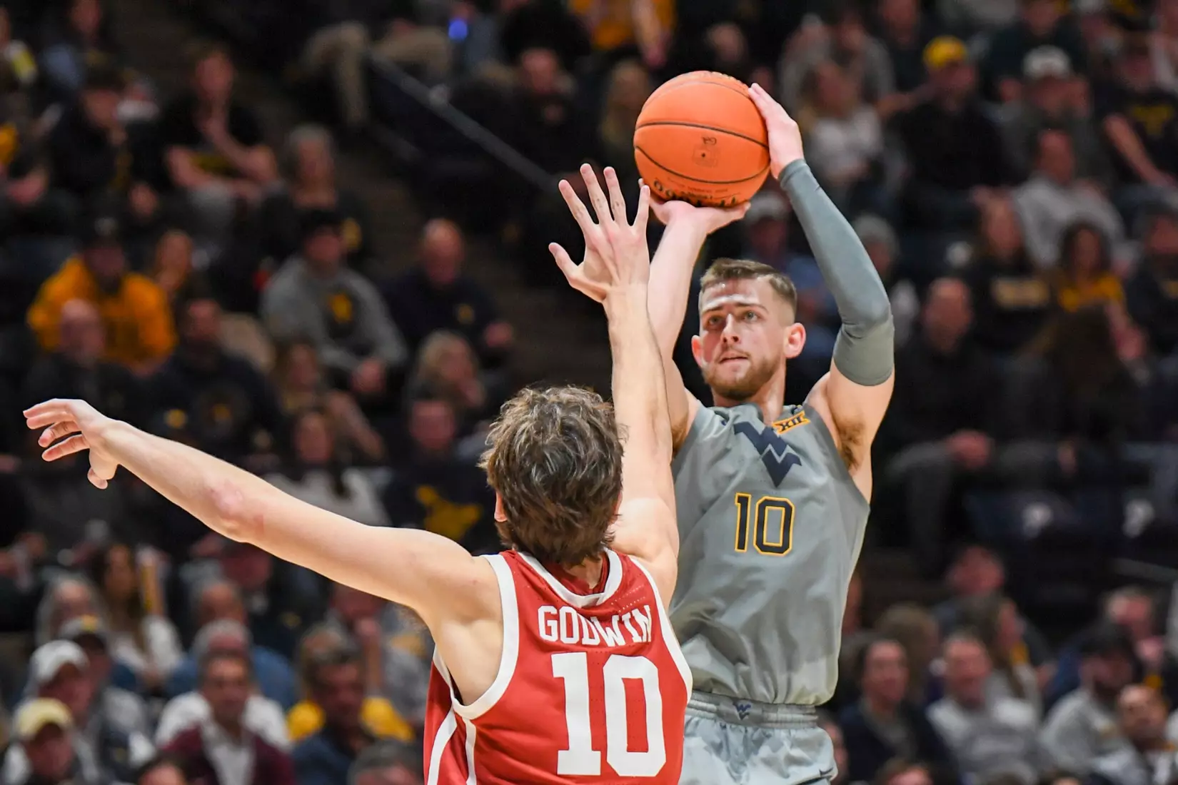 Erik Stevenson hits a three-pointer.