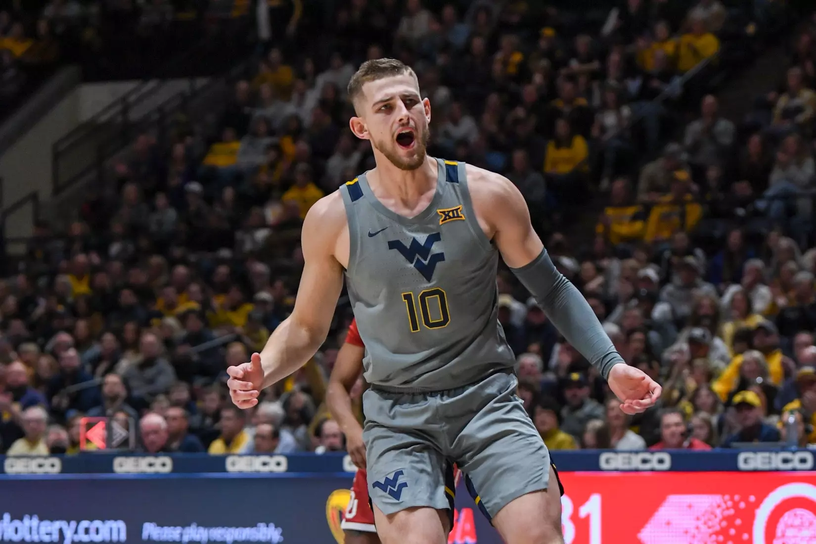 Erik Stevenson celebrates the three.