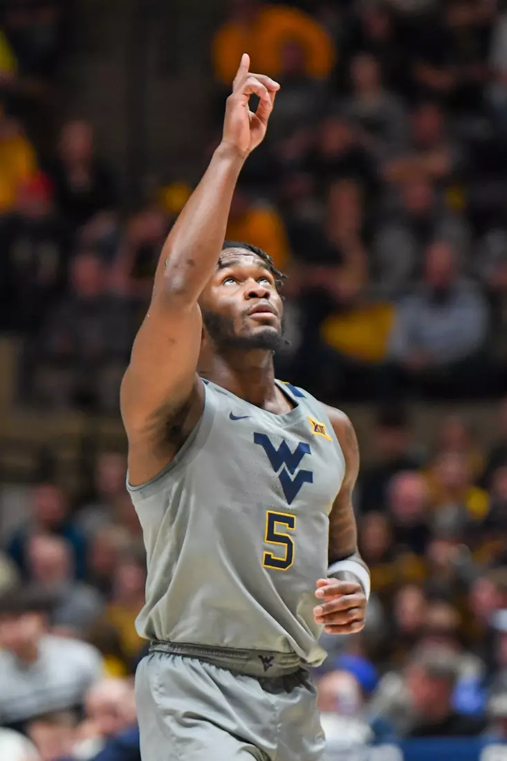 Joe Toussaint points skyward after a foul shot.