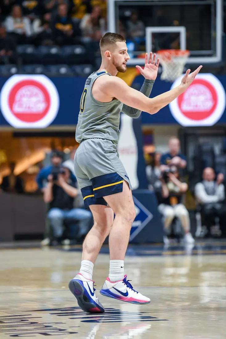 Erik Stevenson celebrates the three.